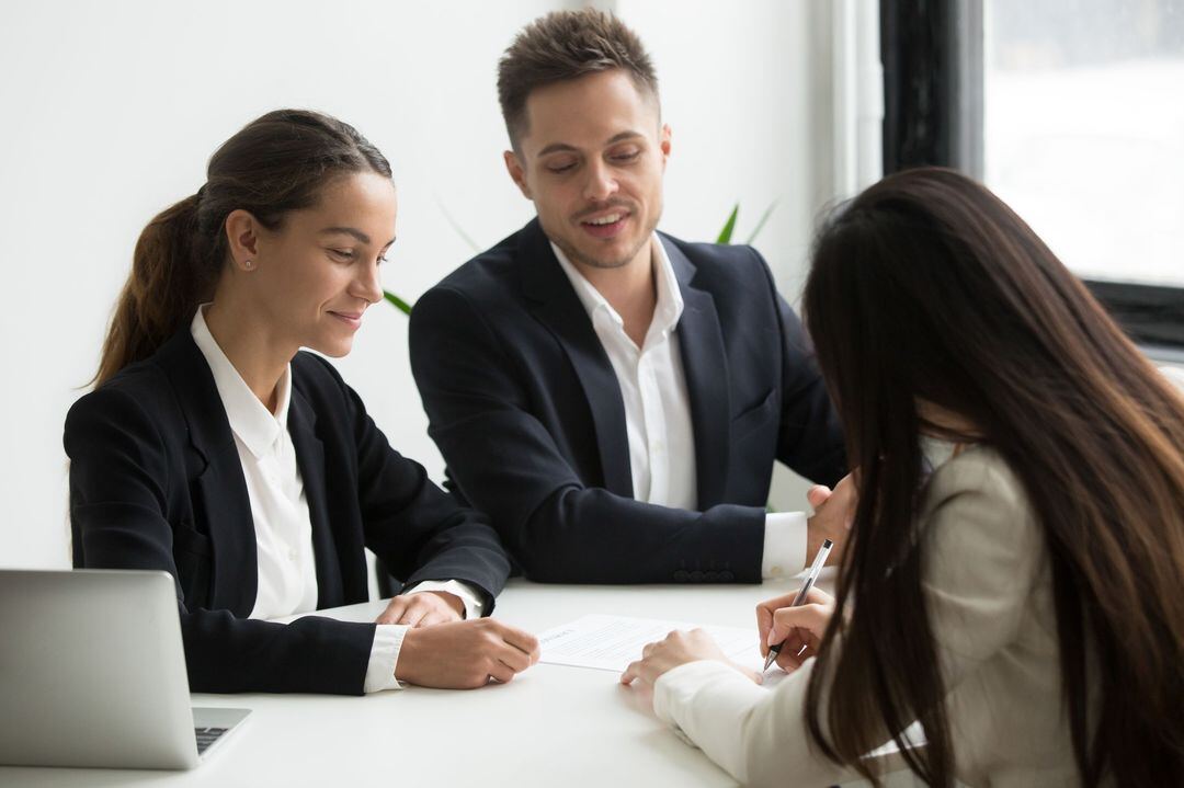 Client signing their hiring paperwork